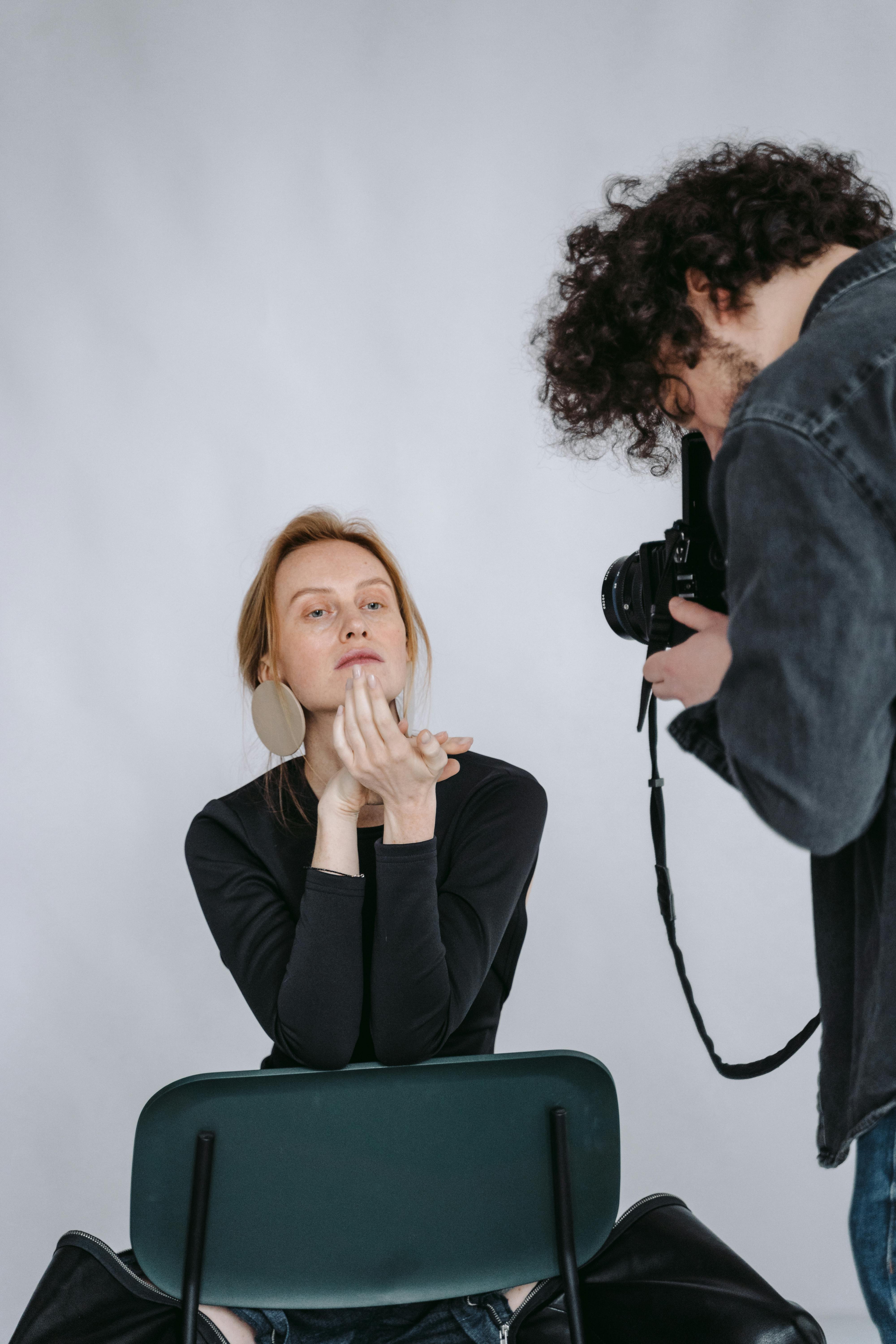 Close-up of camera lens with filter attached on a trail-side rock