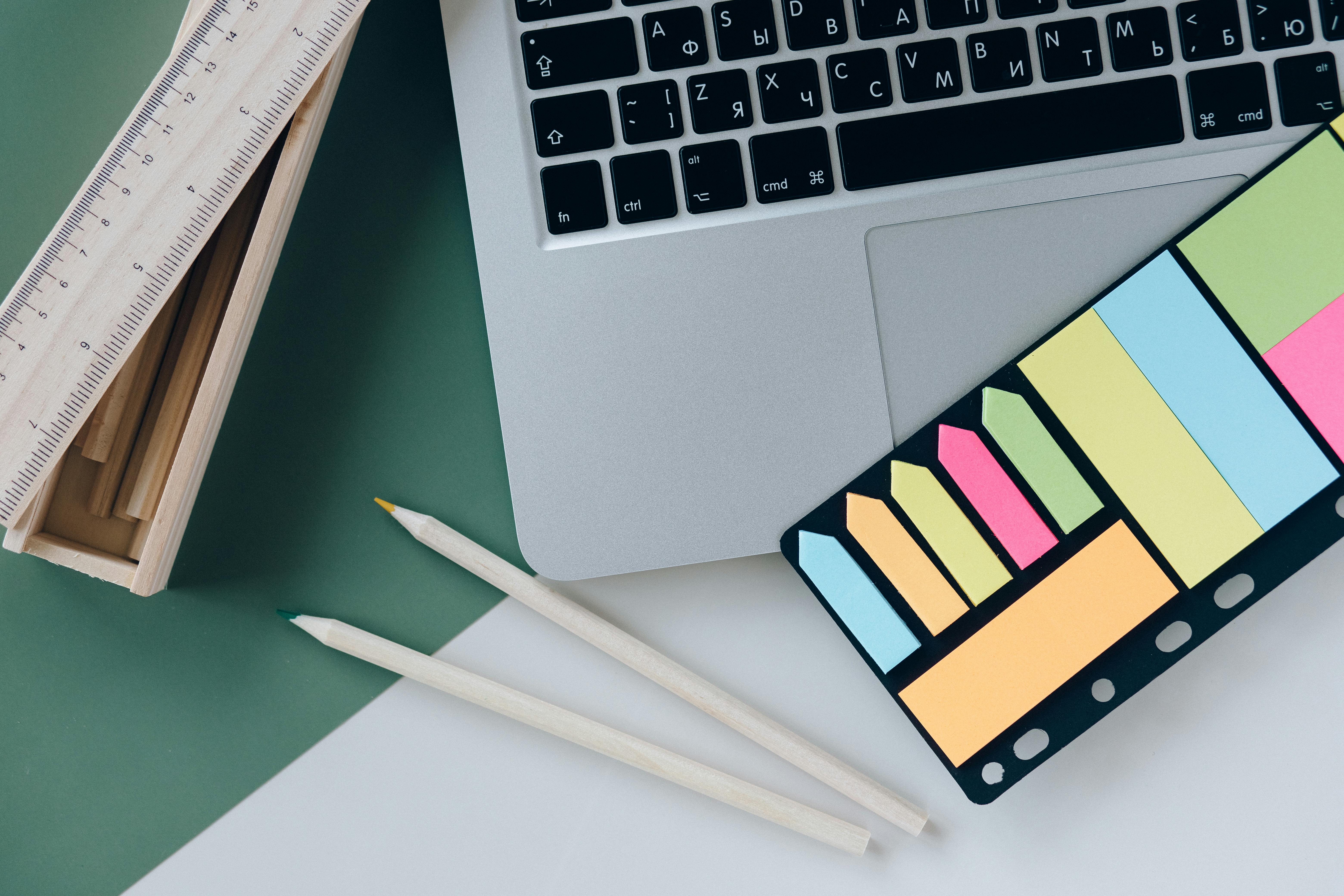 Hiker wearing a backpack with camera accessible on a strap while walking a mountain ridge
