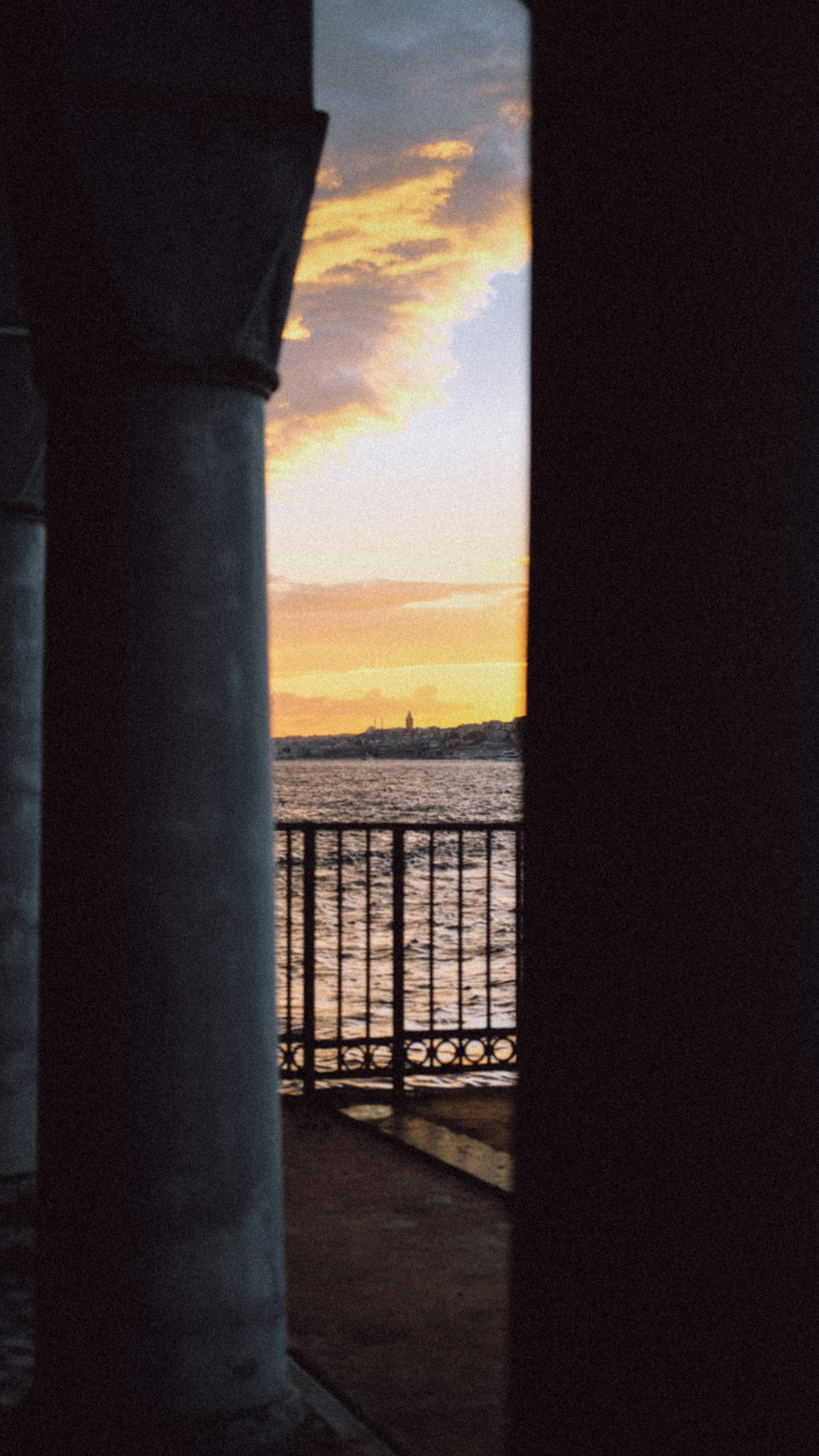 Photographer capturing a candid street moment at golden hour