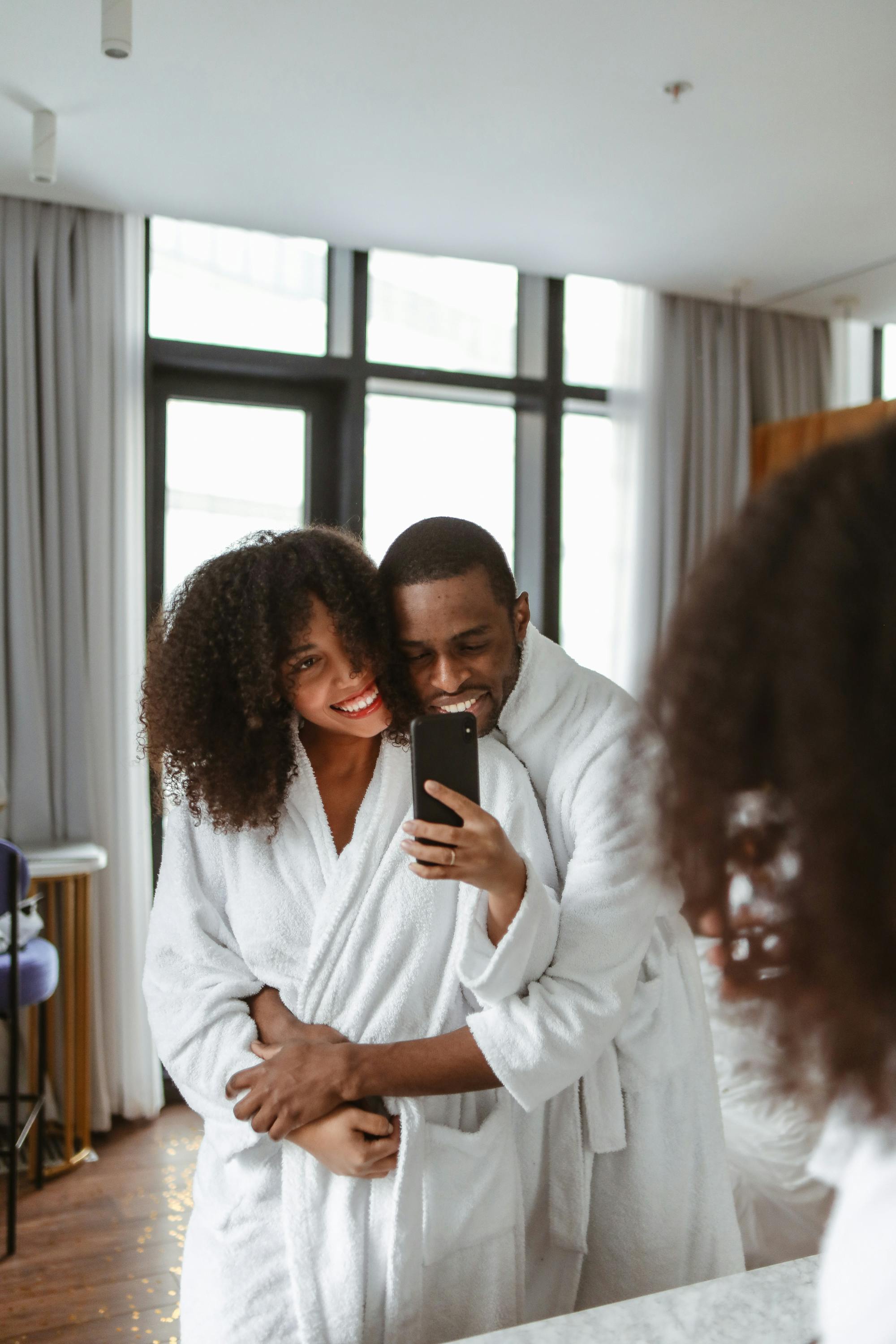 Small camera body with a fast prime lens attached for candid shooting